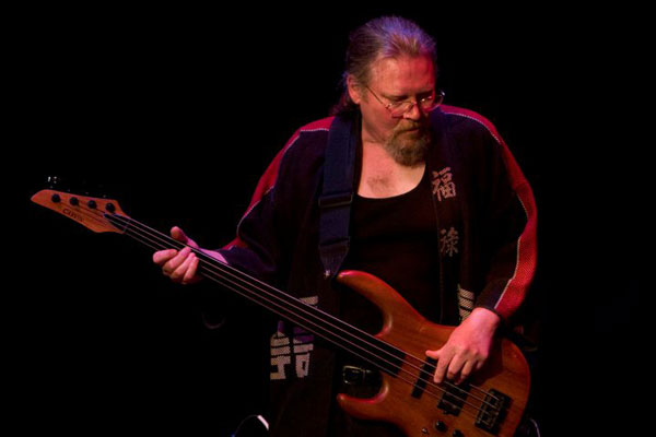 Cloudfire: Dave playing fretless electric bass, Gualala Arts Center, June, 2011 Cloudfire: Dave playing fretless electric bass, Gualala Arts Center, June, 2011